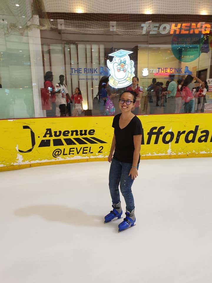 Joanne ice skating on the rink